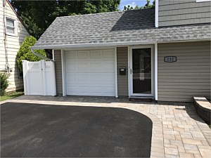 asphalt driveway levitt ranch circle fan design apron toffee onyx cambridge planter wall matryx levittown walkway brick apron by front door